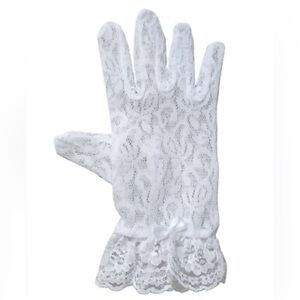 white lace gloves with a bow are labeled for children ages 4-7.